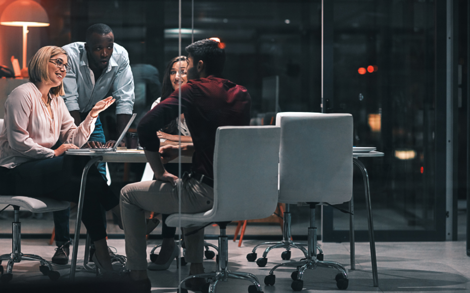 Employees at an evening meeting