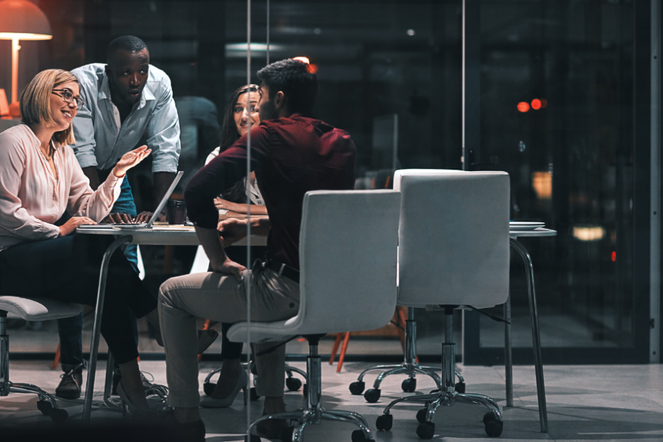 Employees at an evening meeting