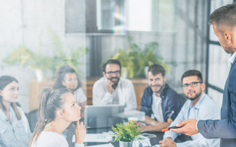 Employees gathered for a business meeting