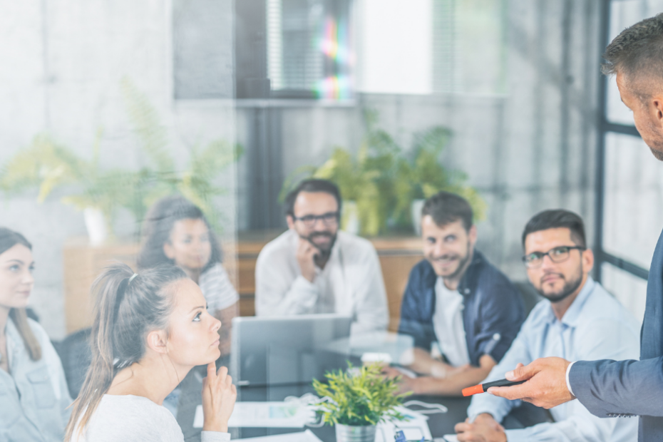 Employees gathered for a business meeting