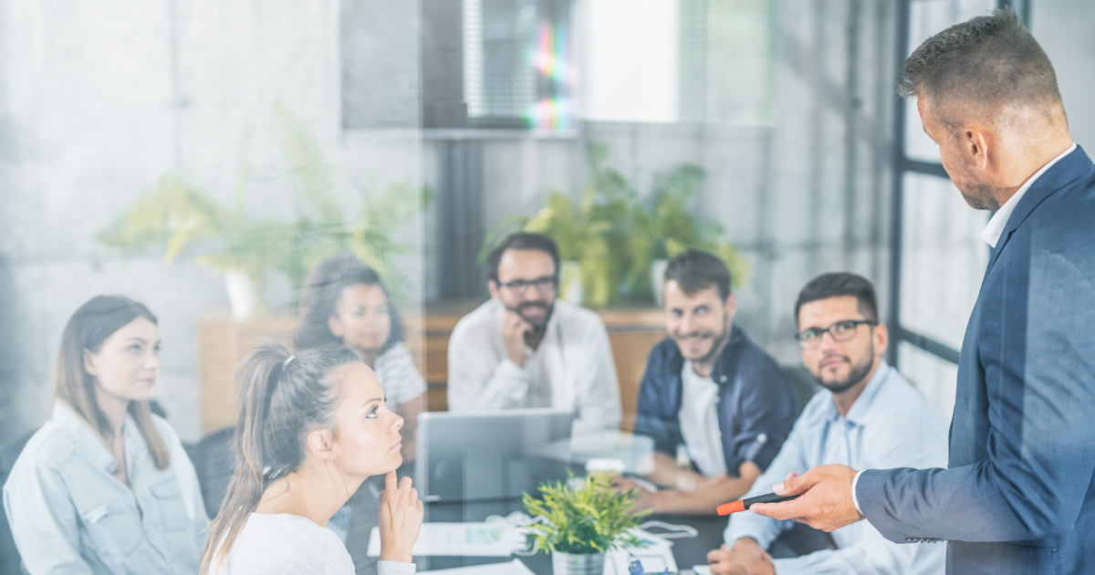 Employees gathered for a business meeting