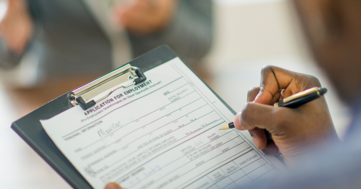 Candidate completing an employment application