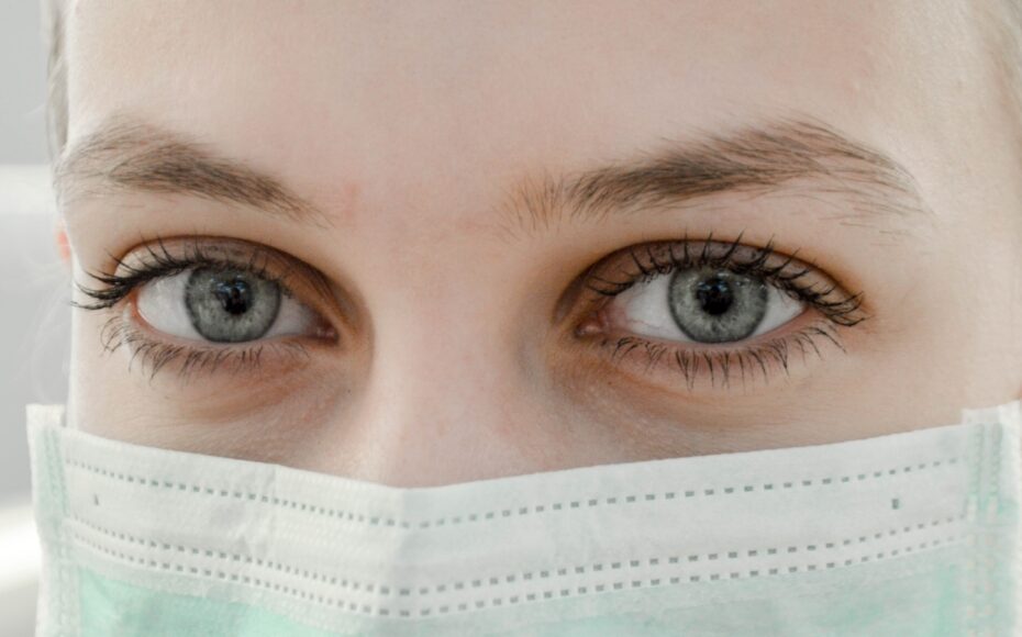 Employee wearing a protective mask