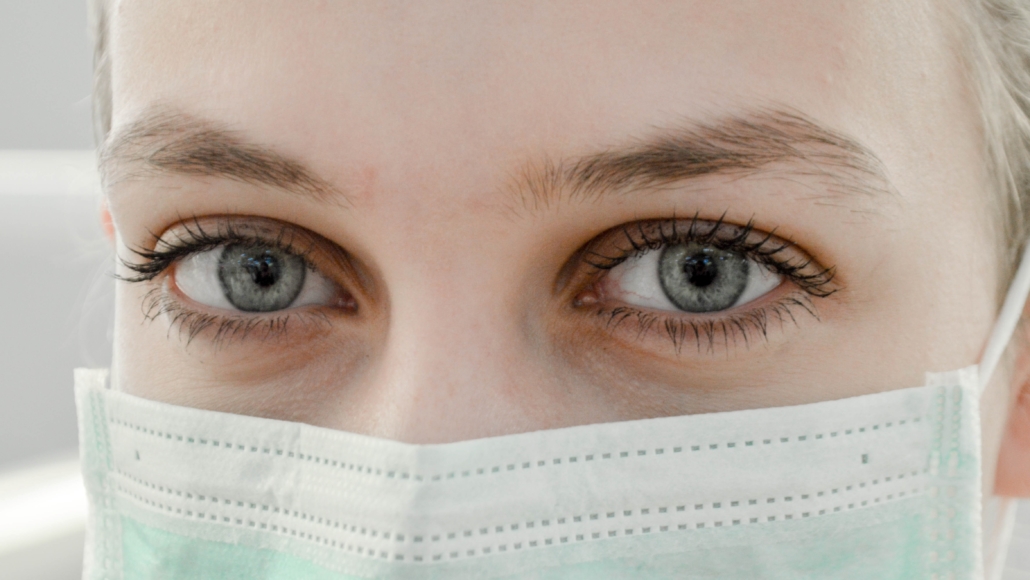 Employee wearing a protective mask