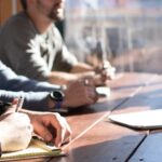 Group of business owners gathered at a table