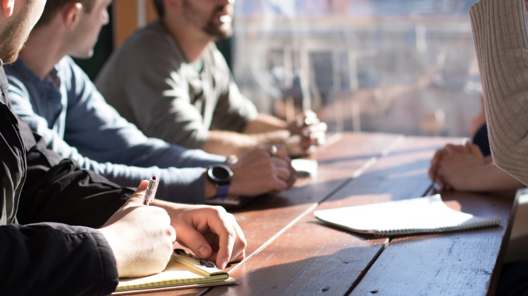 Group of business owners gathered at a table