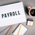 Payroll text on light box