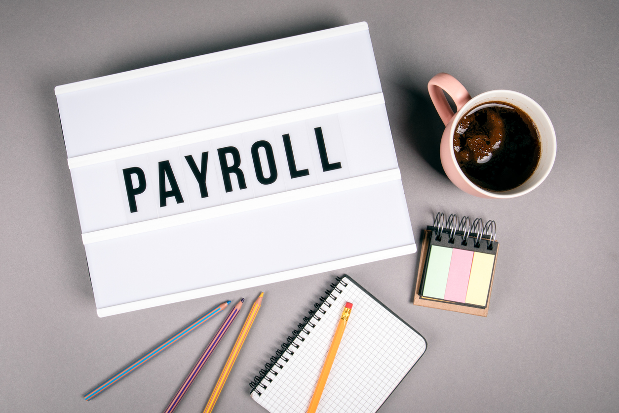 Payroll text on light box