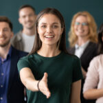 Woman with outstretched hand to shake