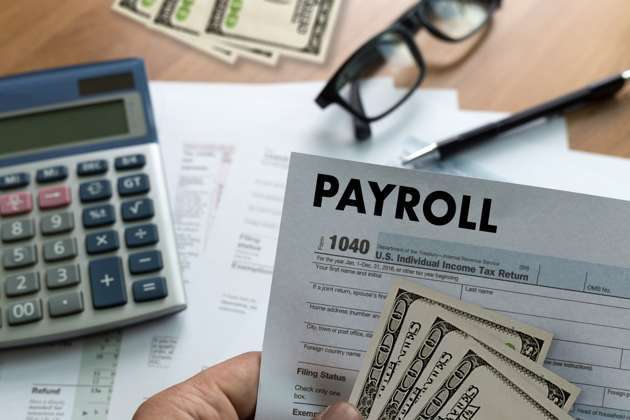 Payroll items on desk