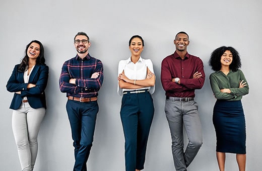 Group of HR employees leaning against wall