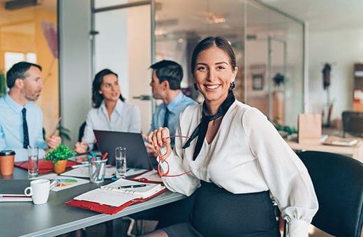 Pregnant employee in the office