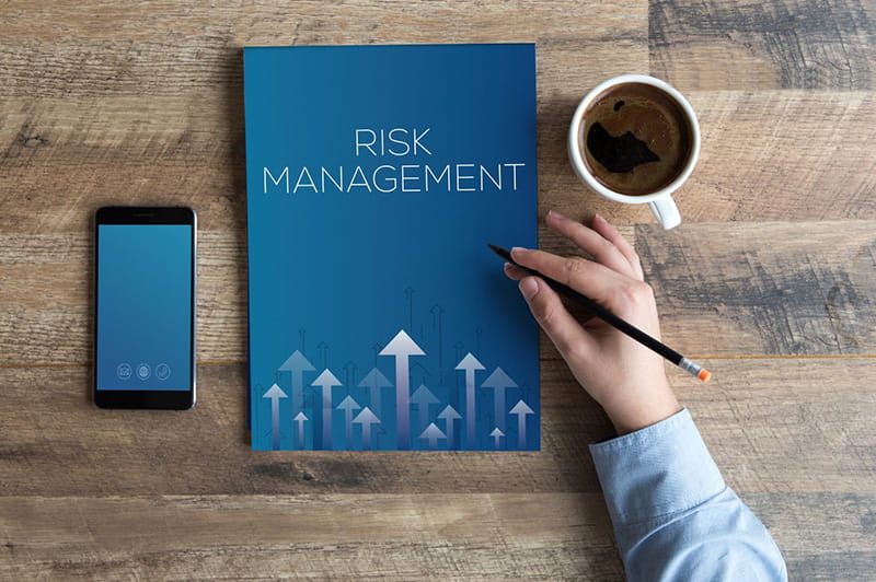 Risk Management book on desk