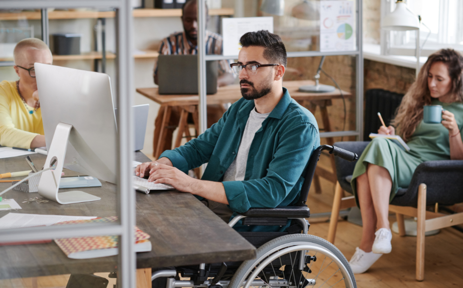 Disabled Businessman Working on Computer