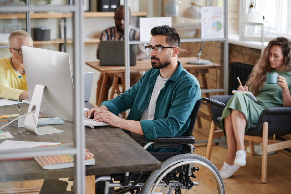 Disabled Businessman Working on Computer